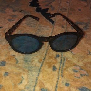 Leopard print type sunglasses with blue frames